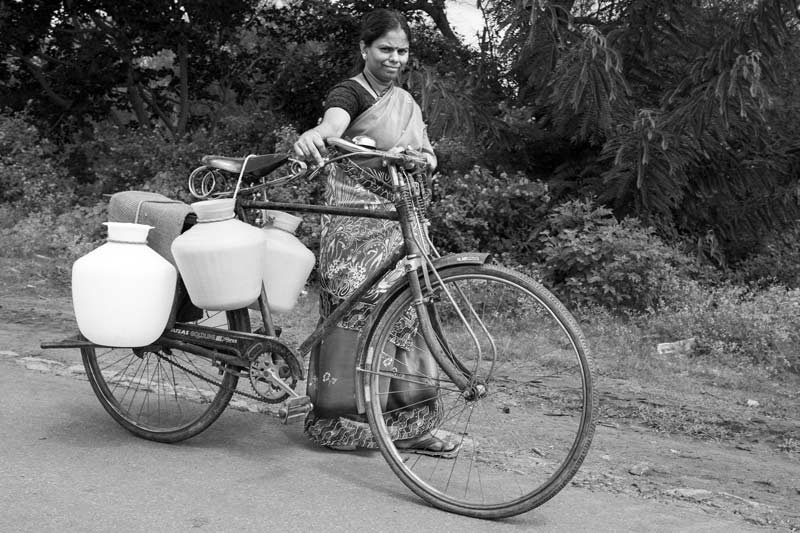 Rural Drinking Water Challenges - Carrying family’s drinking water ration for the day in Bangalore Rural district, Karnataka